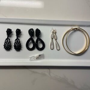 4 pairs of clip on earrings.Sold as a set.